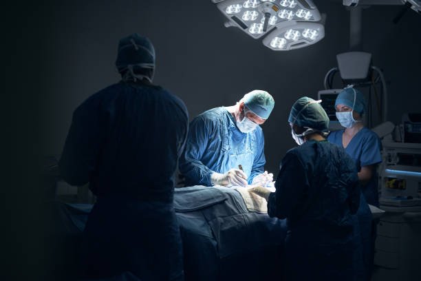 shot of a team of surgeons performing a surgery in an operating theatre